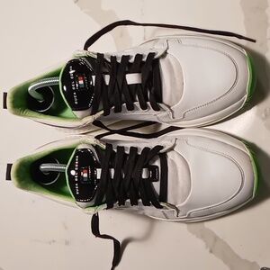 White and Green Athletic Shoes